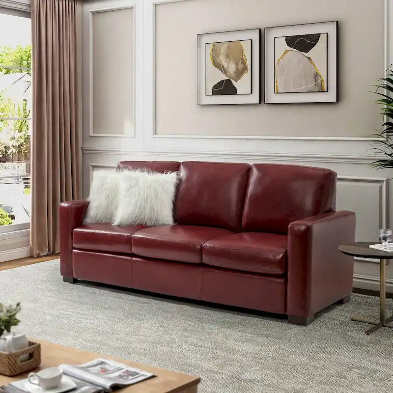 Canapé en cuir véritable de 210 cm de large avec accoudoirs carrés et coussins