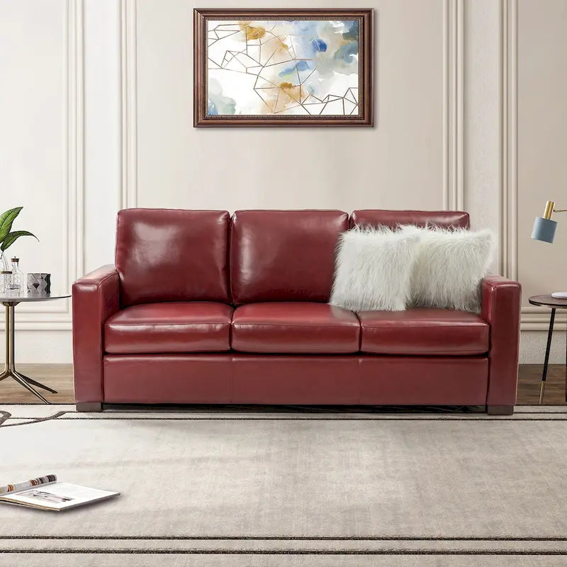Canapé en cuir véritable de 210 cm de large avec accoudoirs carrés et coussins