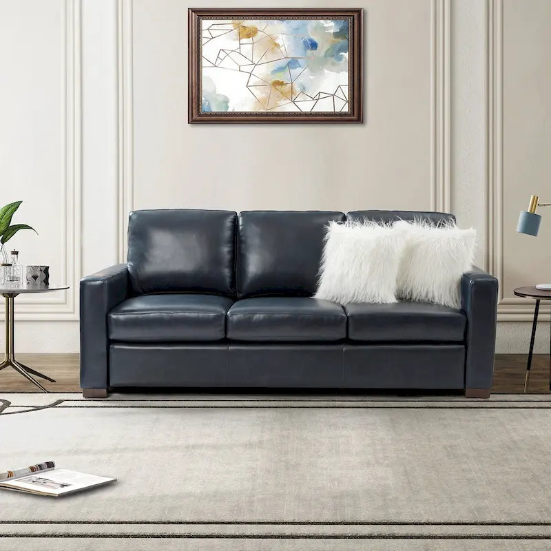 Canapé en cuir véritable de 210 cm de large avec accoudoirs carrés et coussins