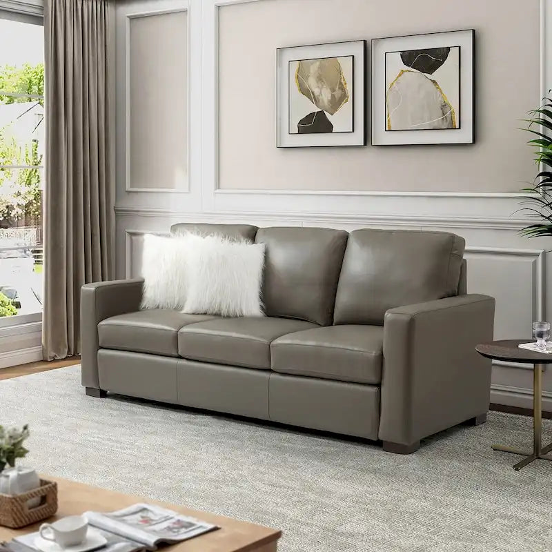 Canapé en cuir véritable de 210 cm de large avec accoudoirs carrés et coussins