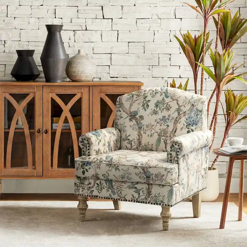 Fauteuil de ferme clouté avec accoudoirs roulés