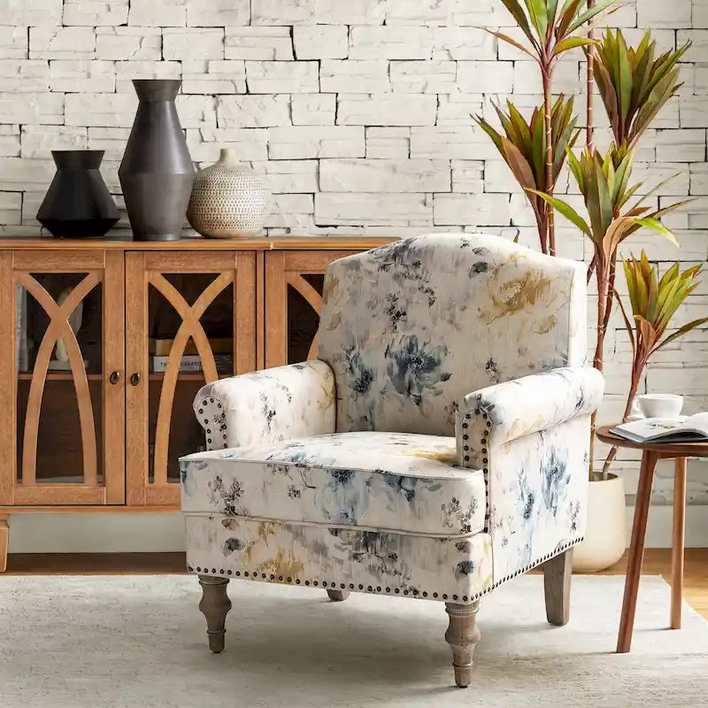 Fauteuil de ferme clouté avec accoudoirs roulés