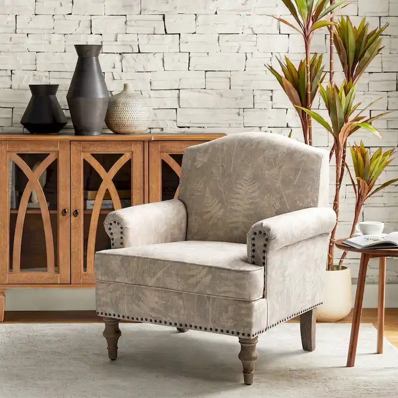 Fauteuil de ferme clouté avec accoudoirs roulés